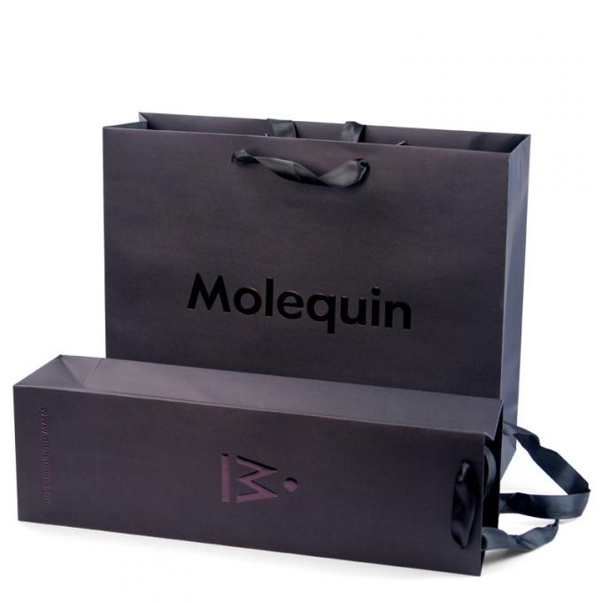 Custom Black Paper Shopping Bags With Ribbon Handles  Stylish Product Packaging Box Design 1